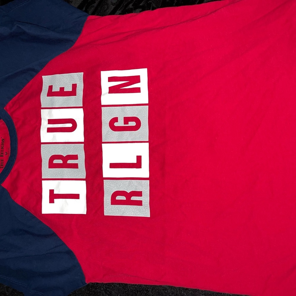 Red and blue true religion shirt. Slightly worn. Good condition.